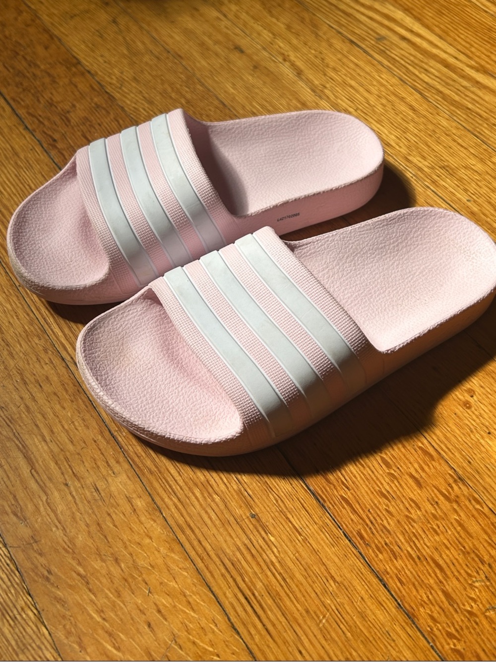 Adidas Pink Slides with White Stripes